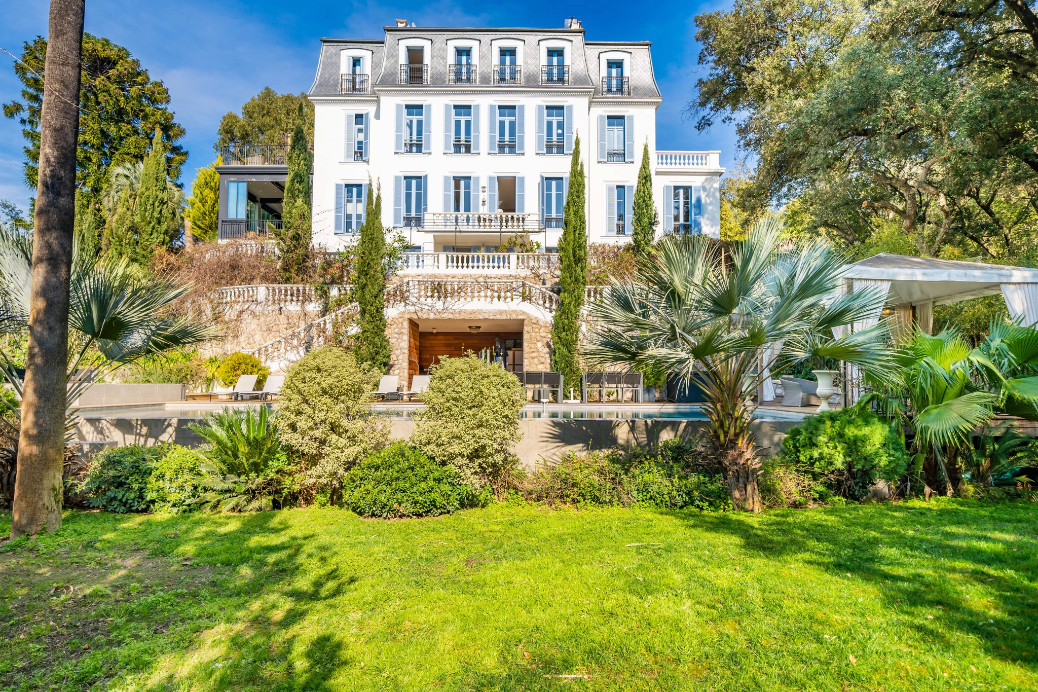Luxury Gardens & Pool at Château Les Alouettes Cannes Exterior gardens and swimming pool at Château Les Alouettes luxury villa in Cannes.