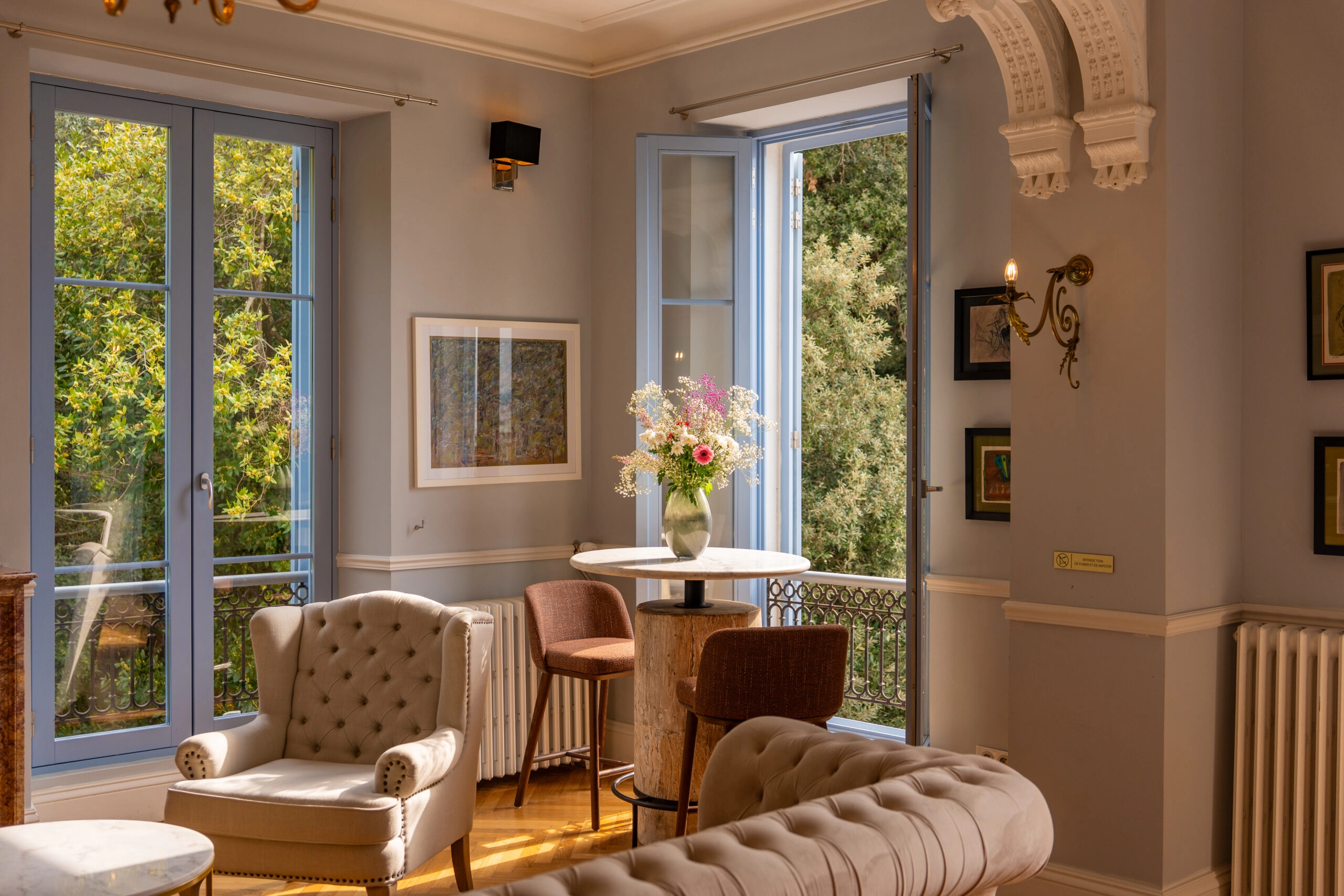 luxury-dining-room-dark-elegant-cannes Luxury living and dining room with classic French interiors at Château Les Alouettes Cannes villa.